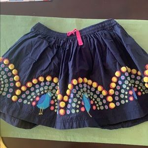 mini boden peacock skirt w/ raised Pom feathers